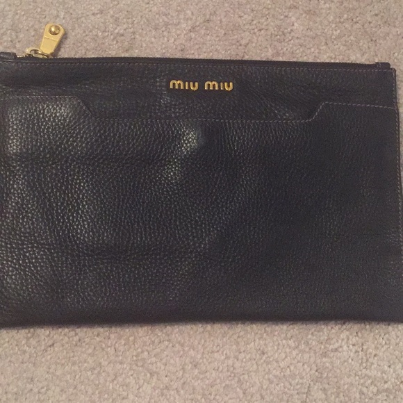 Miu Miu Handbags - Miu miu textured leather clutch / pouch.